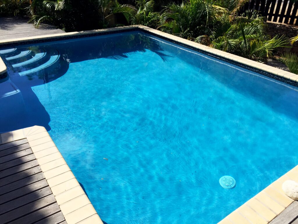 An inground pool with a Blue Lagoon finish.
