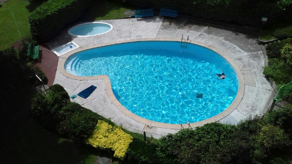 An inground pool with a Kona Coast finish.