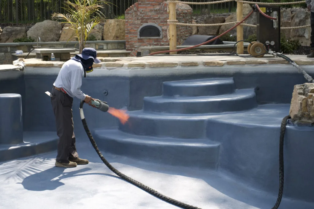 a man applying an ecofinish coating