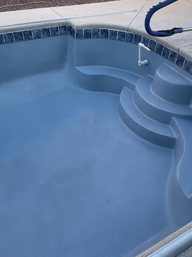 fiberglass swimming pool with a polyfibro coating