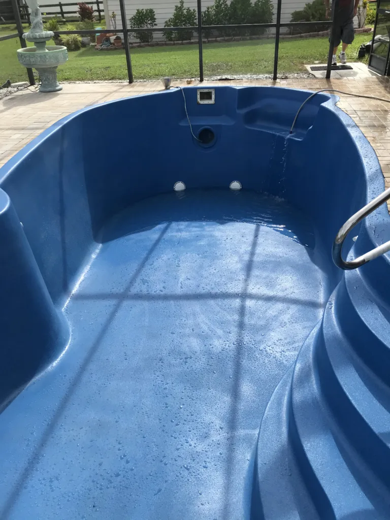 a fiberglass pool with an ecofinish coating