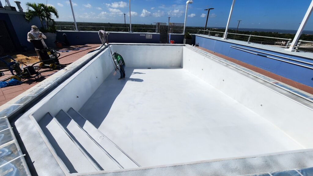 inground pool with a commercial white ecofinish coating